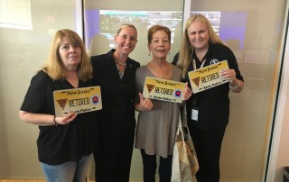 1 Lady Blue & Gold members holding awards