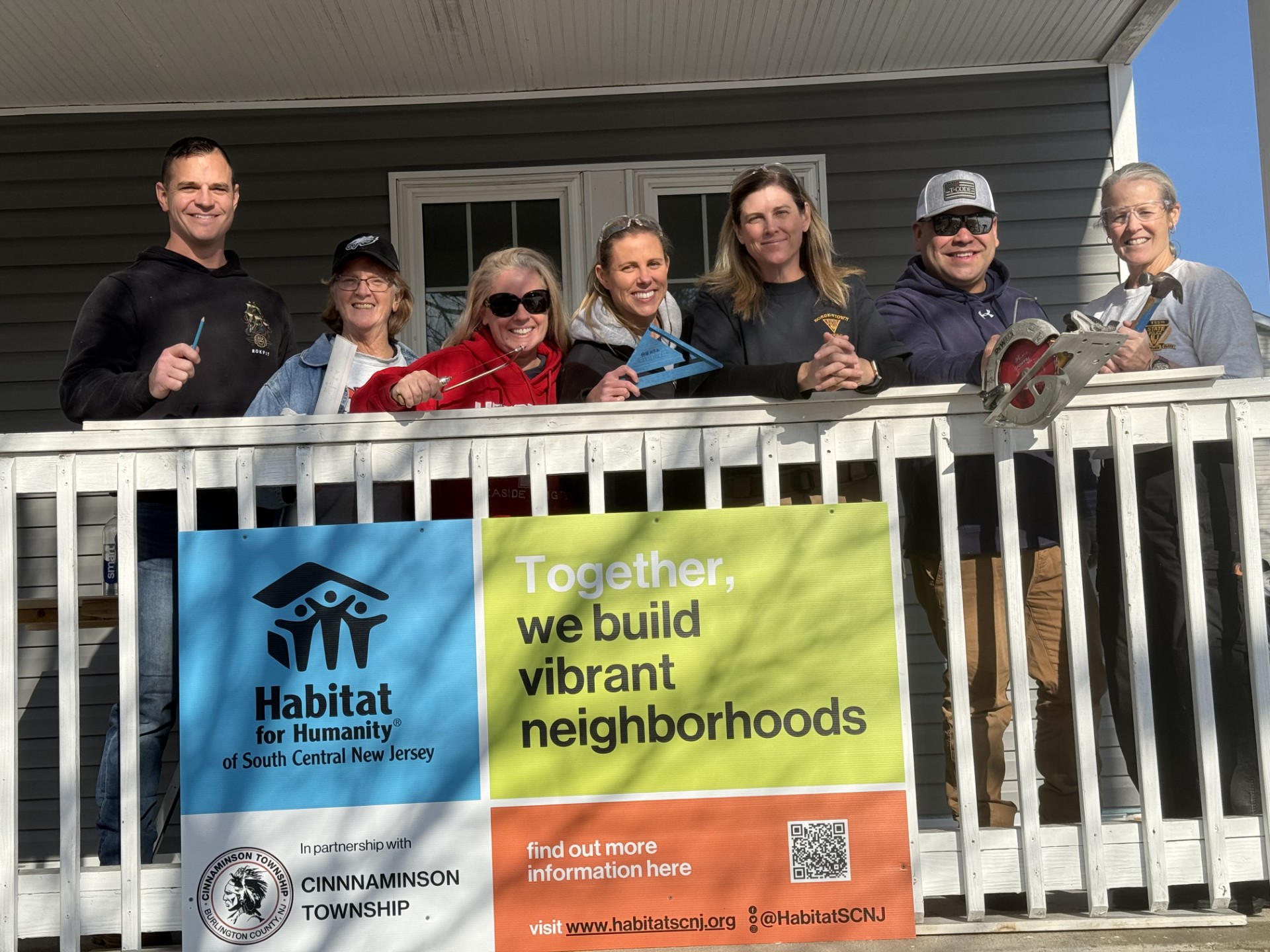 14 Lady Blue & Gold volunteers with Habitat for Humanity