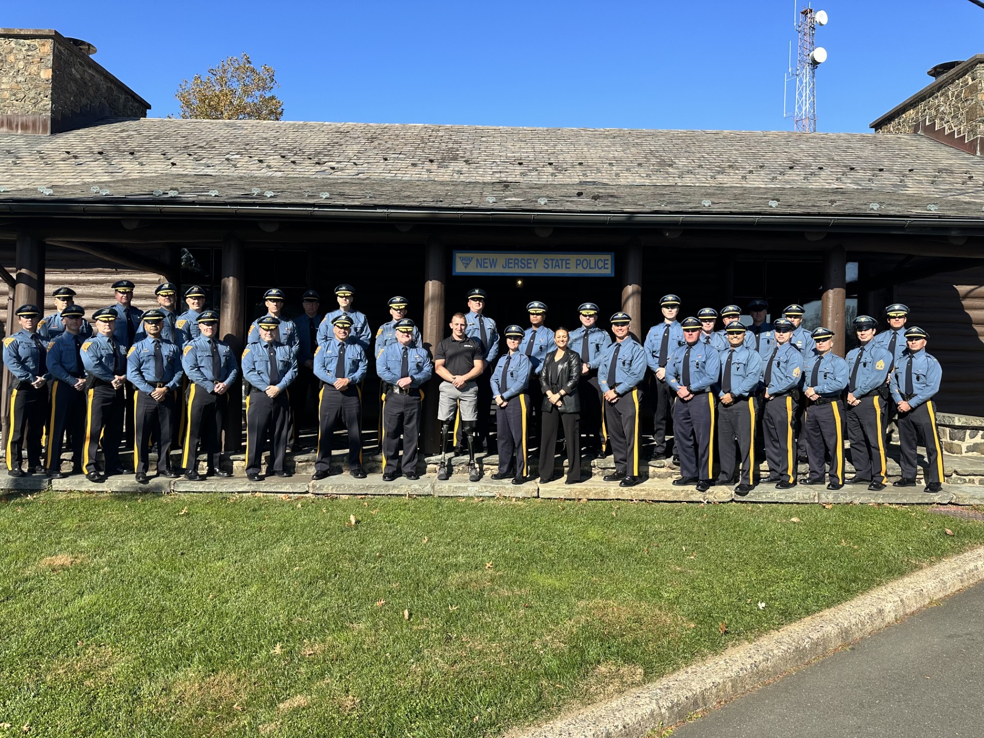 8 NJ State Troopers lined up in formation